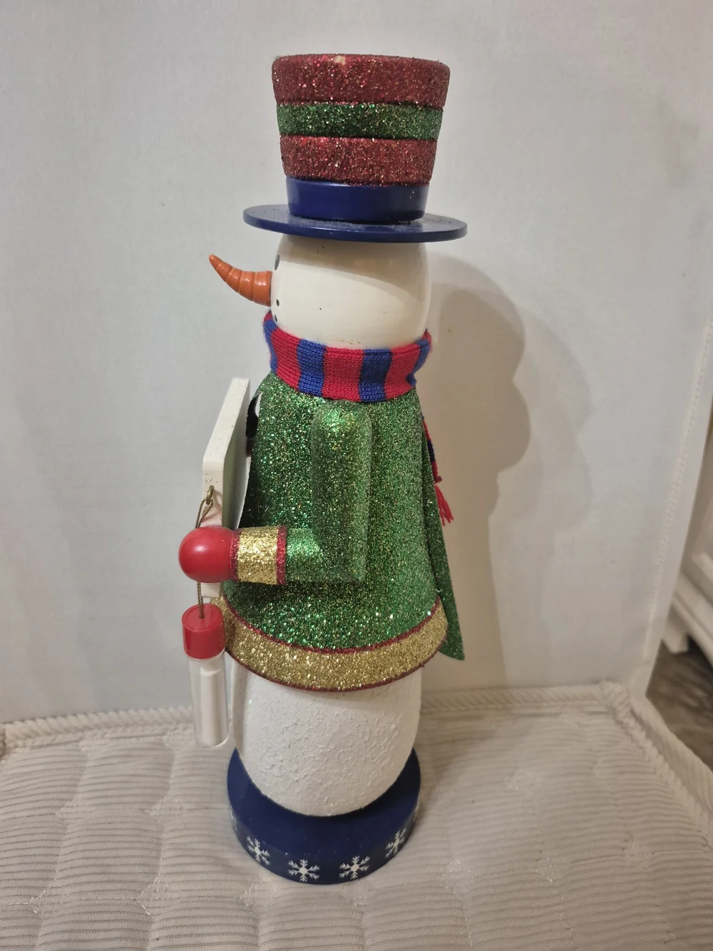 Festive Green Glitter Snowman Holiday Nutcracker with Red & Blue Accents